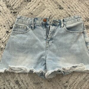 YMI jeans,size 4. Light color washed Jean shorts. Small rips on the end. Women